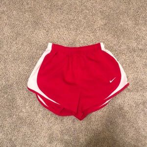 Red Nike shorts
